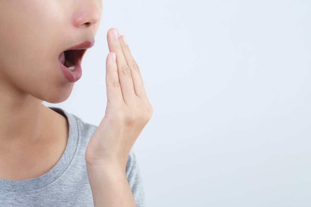 what causes bad breath and how to treat it